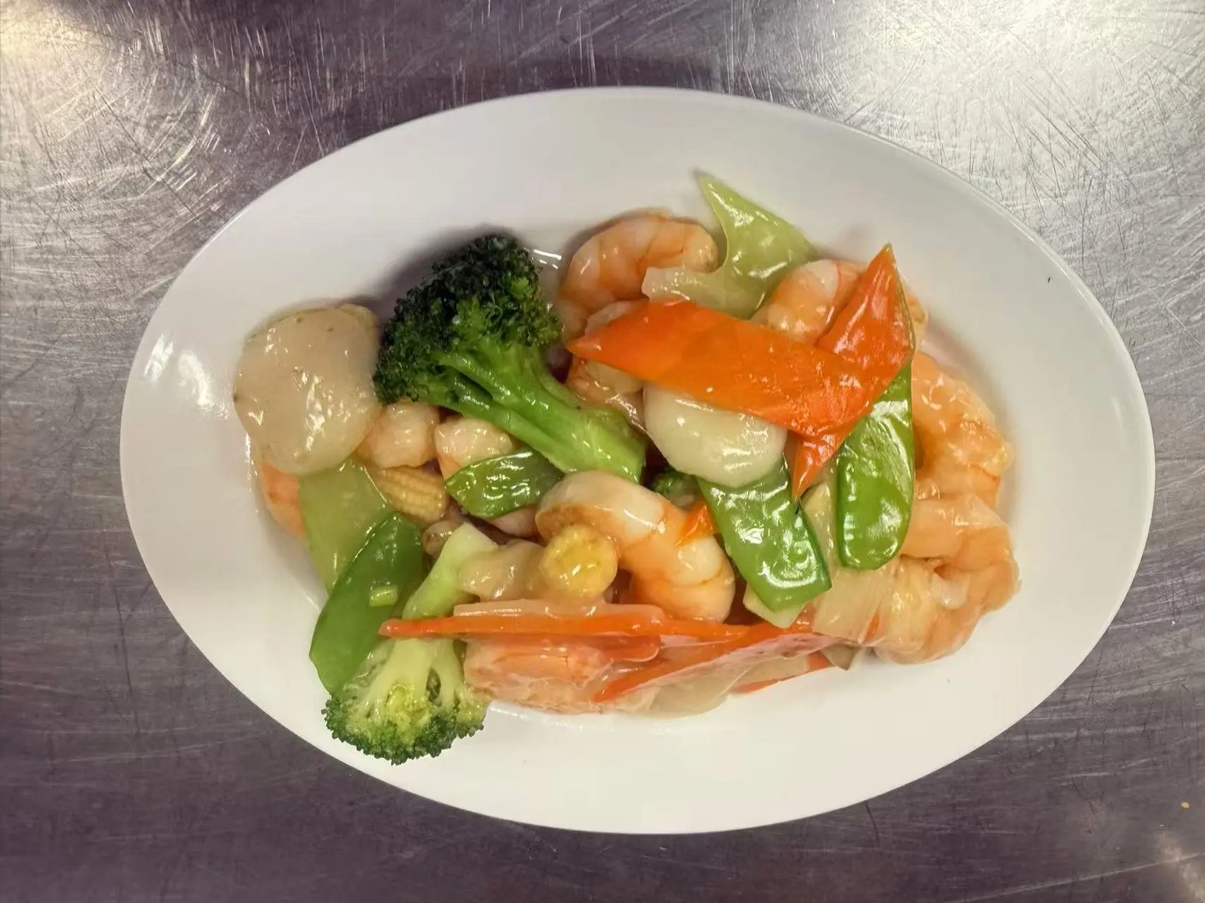 Shrimp with Mix Vegetables shows stir - fried shrimp combined with assorted vegetables like broccoli, snow peas and carrots at China Panda, a Asian Cuisine restaurant in Athens