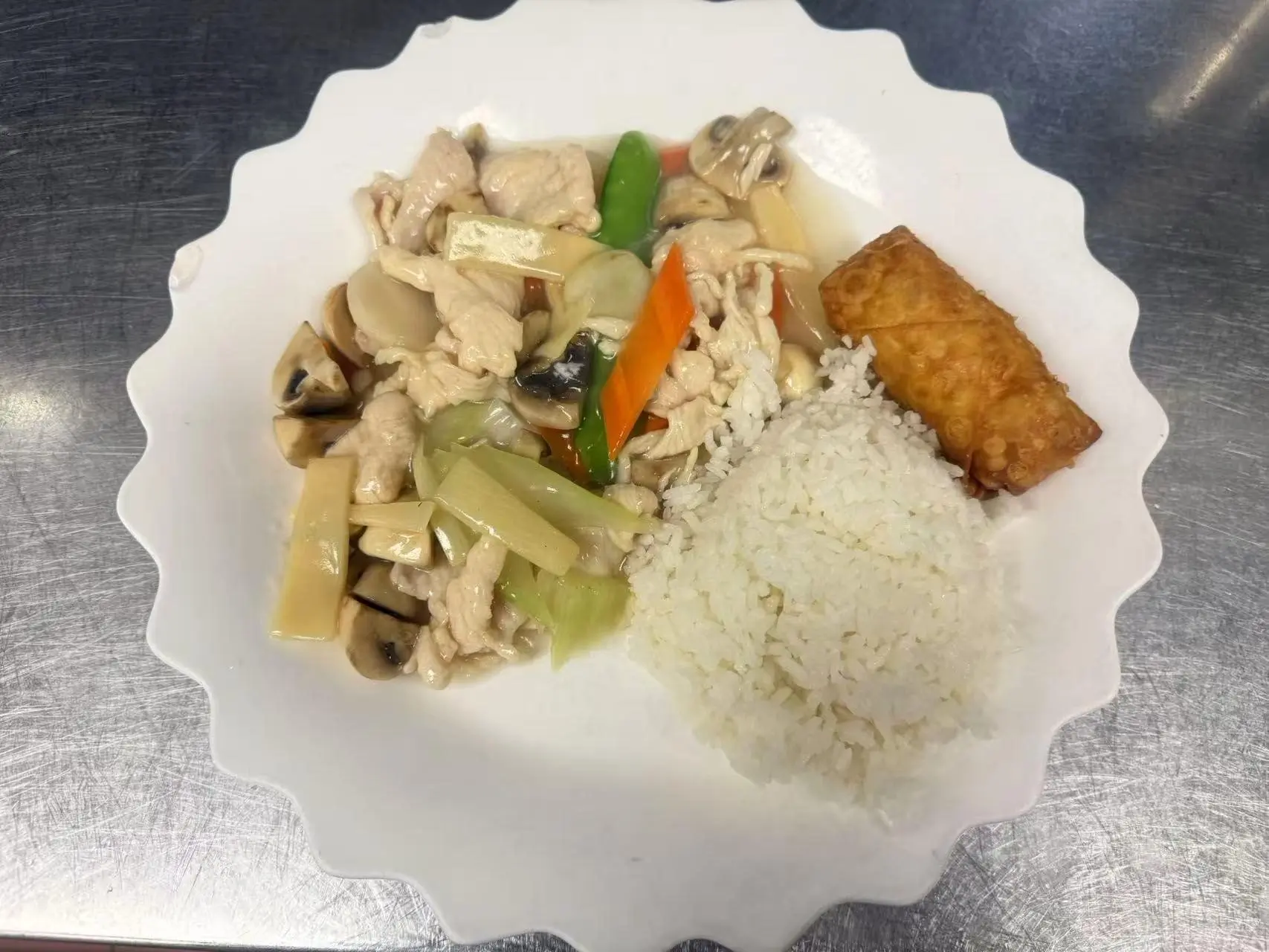 China-Panda-Chinese-restaurant-Moo-Goo-Gai-Pan-Combination-Athens Moo Goo Gai Pan Combination presents stir - fried chicken and mushrooms with vegetables, served with white rice and an egg roll at China Panda, a Asian Cuisine restaurant in Athens